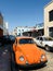 An orange car on the sunny streets of Mexico - MEXICO
