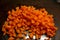 Orange carrots chopped up into small chucks for cooking a home cooked meal.