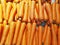 Orange carrots placed on the floor to sell to wait for people to come.