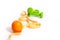 Orange, centimeter tape, green dumbbells on a white background with space for text.