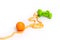 Orange, centimeter tape, green dumbbells on a white background with space for text.