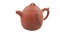 Orange ceramic teapot with traditional drawing