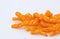 Orange Cheese Puff Snacks on White Background