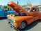 orange Chevrolet Fleetmaster 1947  coupe classic car. Open hood showing engine. Expo Fierros 2021