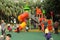 Orange children`s play slide and children in Chinaï¼ŒAsia