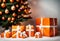 orange christmas gift parcels under a tree decorated with matching baubles