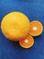 Orange, citrus fruit, rough orange peel, cut orange, fruit flesh, cut fruit, juicy and vitamin-rich food