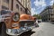 Orange classic car in Old Havana, Cuba