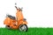 Orange Classic Vintage Retro or Electric Scooter in Green Grass. 3d Rendering