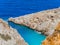 Orange cliffs and beautiful blue sea - Crete, Greece
