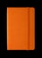 Orange closed notebook isolated on black