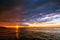 Orange cloudscape and dramatic blue sky