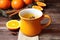 orange and clove spiced cider in ceramic mug