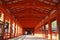 Orange colonnade leading to the temple of Miyajima (in the Hiroshima region, Japan) on the Itsakushima island as a symbo
