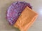 Orange color cotton cloth in changair for keeping roti or chapati or paratha warm and hot