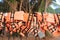 Orange color life jackets hanging in the row