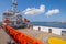 Orange colored EU ship for fishery inspection in the port of IJmuiden, the Netherlands.