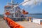 Orange colored EU ship for fishery inspection in the port of IJmuiden, the Netherlands.