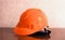 Orange construction helmet background