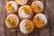 Orange cookies with mint and powdered sugar close-up. Horizontal