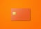 Orange credit card on a color background