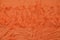 Orange crumpled textile background