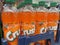 Orange crush soda 6 packs on display