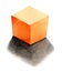 orange cube - light from the back, basic geometric shapes with dramatic light and shadow in watercolor style. Solids isolated on a