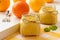 Orange curd english citrus cream in glass jars.