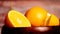 Orange cutting fruit and Whole fruits, close up view of orange,light full and dark effect