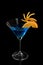 Orange decor Martini Blue Curacao on a black background