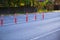 Orange dividing posts on the road. Selective focus