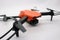 Orange drone with camera