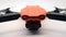 Orange drone with camera