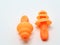 Orange earplug Placed on a white background