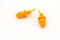 Orange earplugs on white background. Copy space