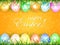 Orange Easter background with eggs in grass