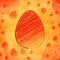 Orange easter egg over yellow old paper background with eggs