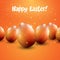 Orange Easter eggs on orange background