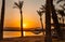 Orange Egyptian Sunset over the mountains and Red Sea resort with reflection, Soma Bay, Hurghada, Egypt