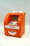 Orange electronic children`s ING money box