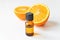 Orange essential oil in dark glass bottle. Aromatherapy treatment. Naturopathic medicine