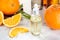 Orange essential oil. Orange oil on glass bottle with dropper. Citrus oil