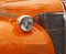 Orange Fender of an Antique Car