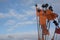 Orange flags and cloudscape