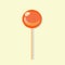 An orange flavored lollipop of simple round shape.