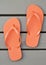 Orange Flip Flops on the Deck