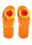 Orange flip-flops with flowers