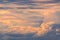 Orange fluffy clouds, blue sky