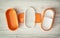 Orange folding plastic food box on the wooden background